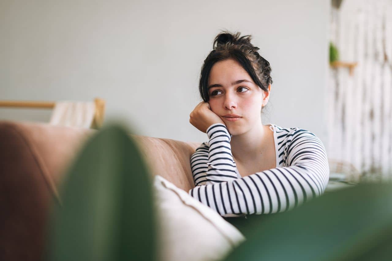 Woman sitting on a couch Nervous Breakdown