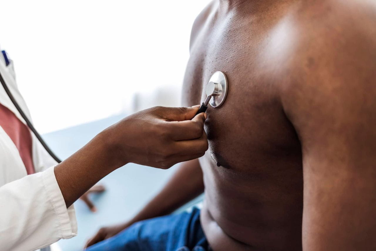Doctor checking heart rate