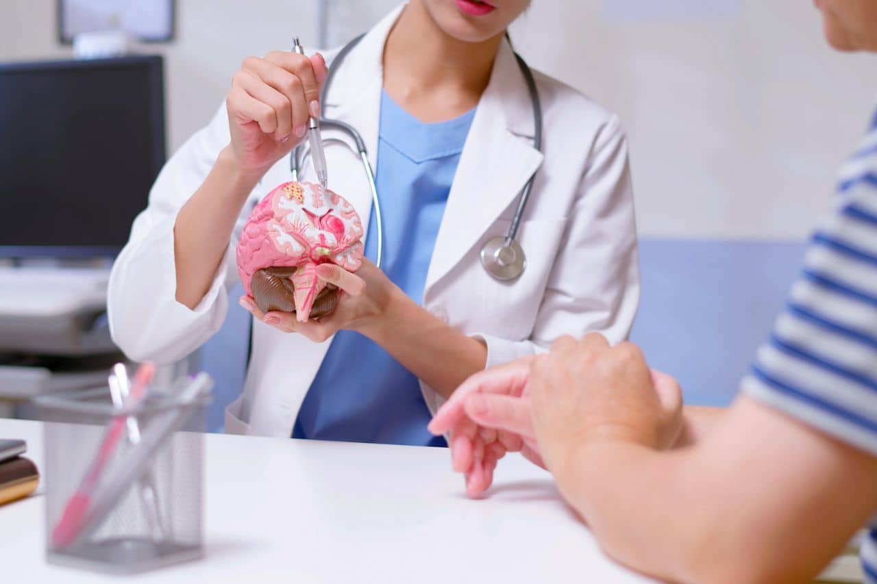 Neurologist speaking with patient about the brain