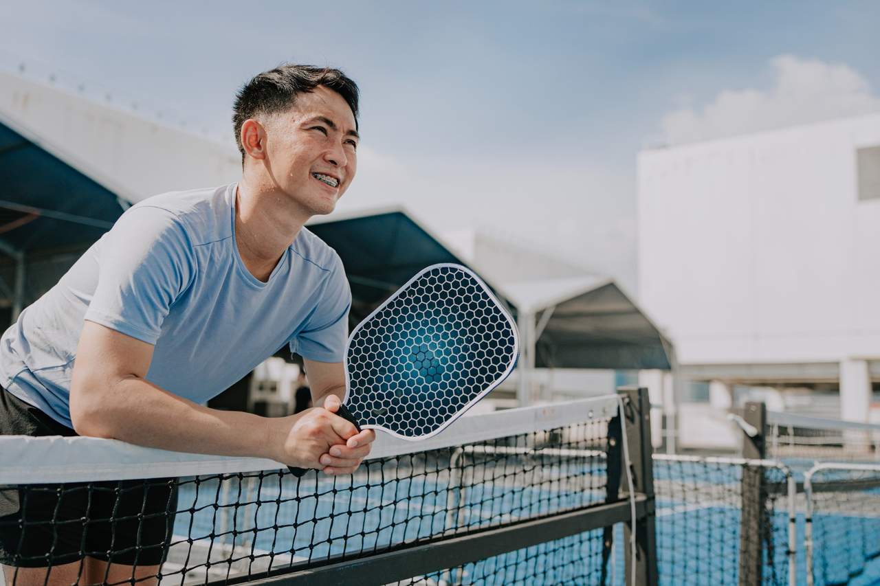 Pickleball player at the court