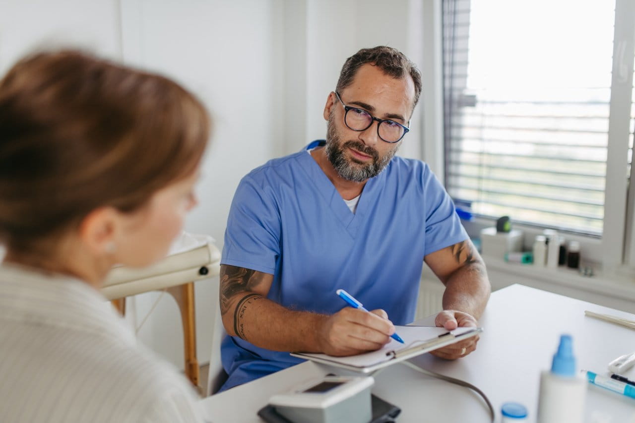 doctor consultation writing notes