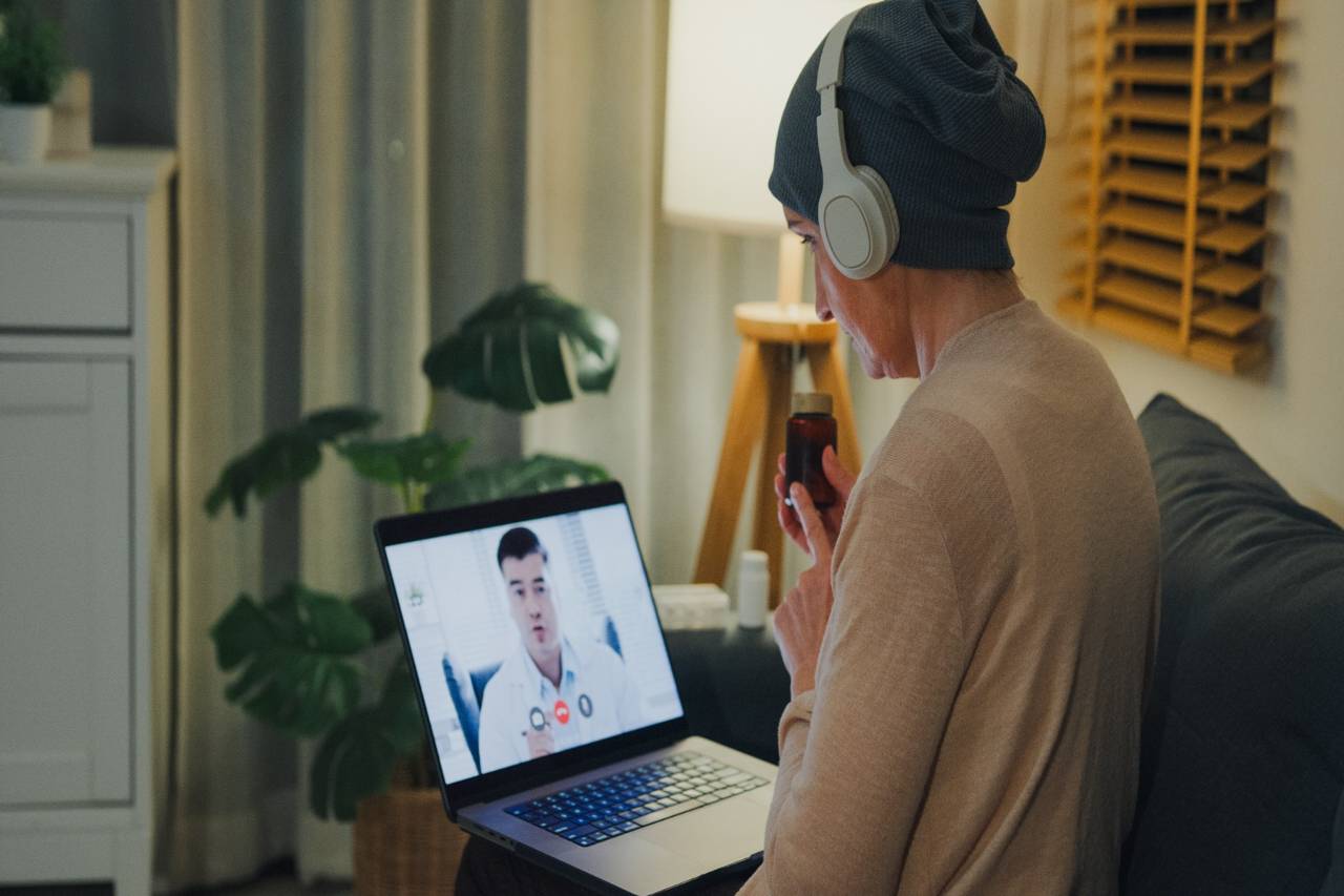 Patient having telehealth video call with doctor