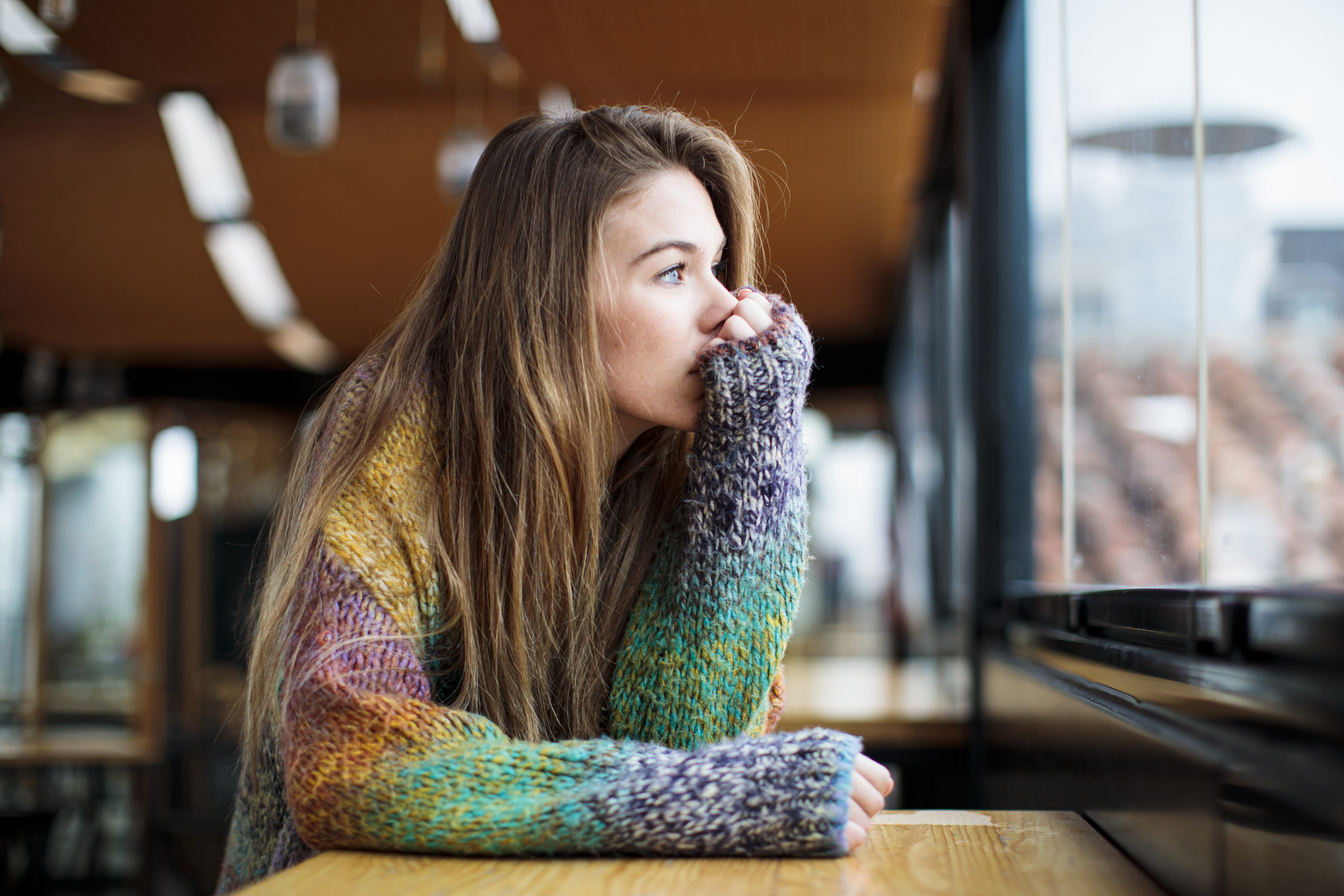 woman concerned about her long menstrual cycle