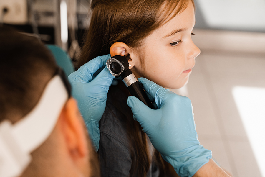 Kid getting an ear check
