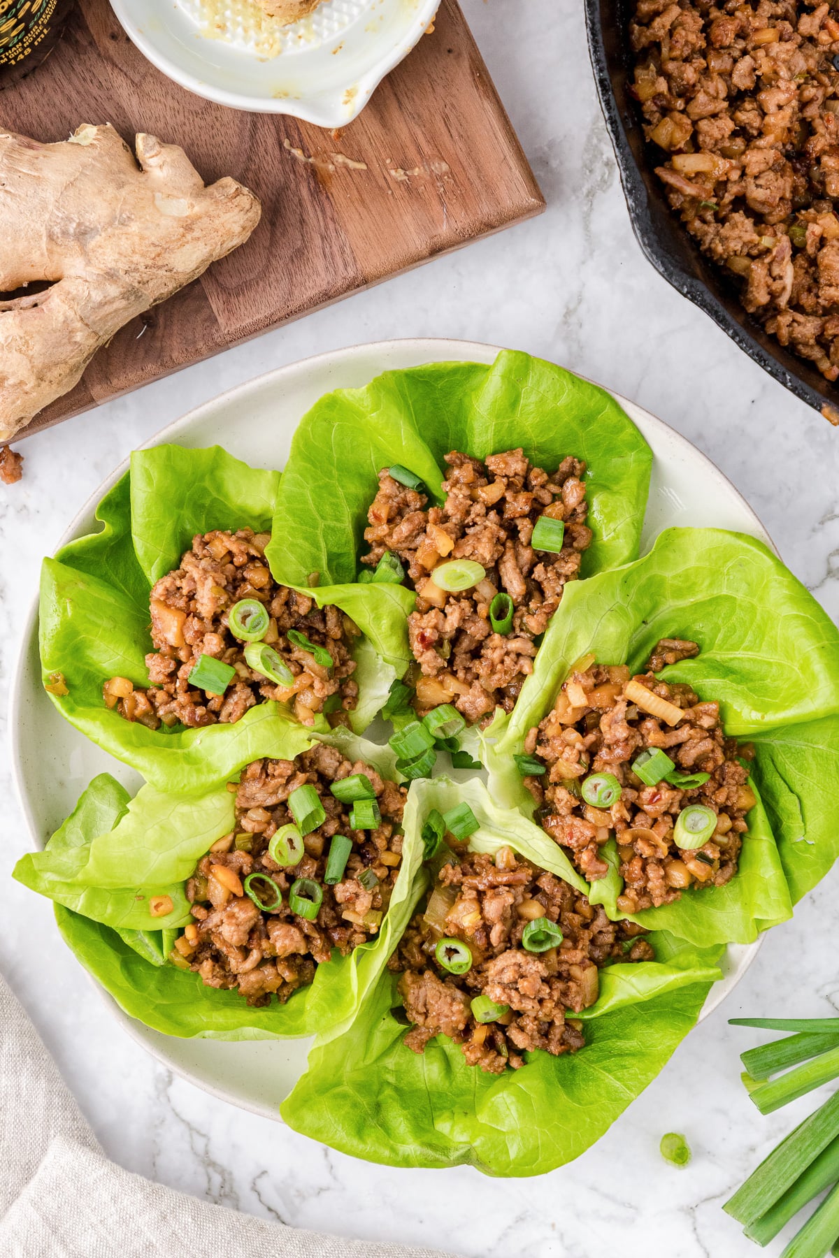Asian lettuce wraps on plate.