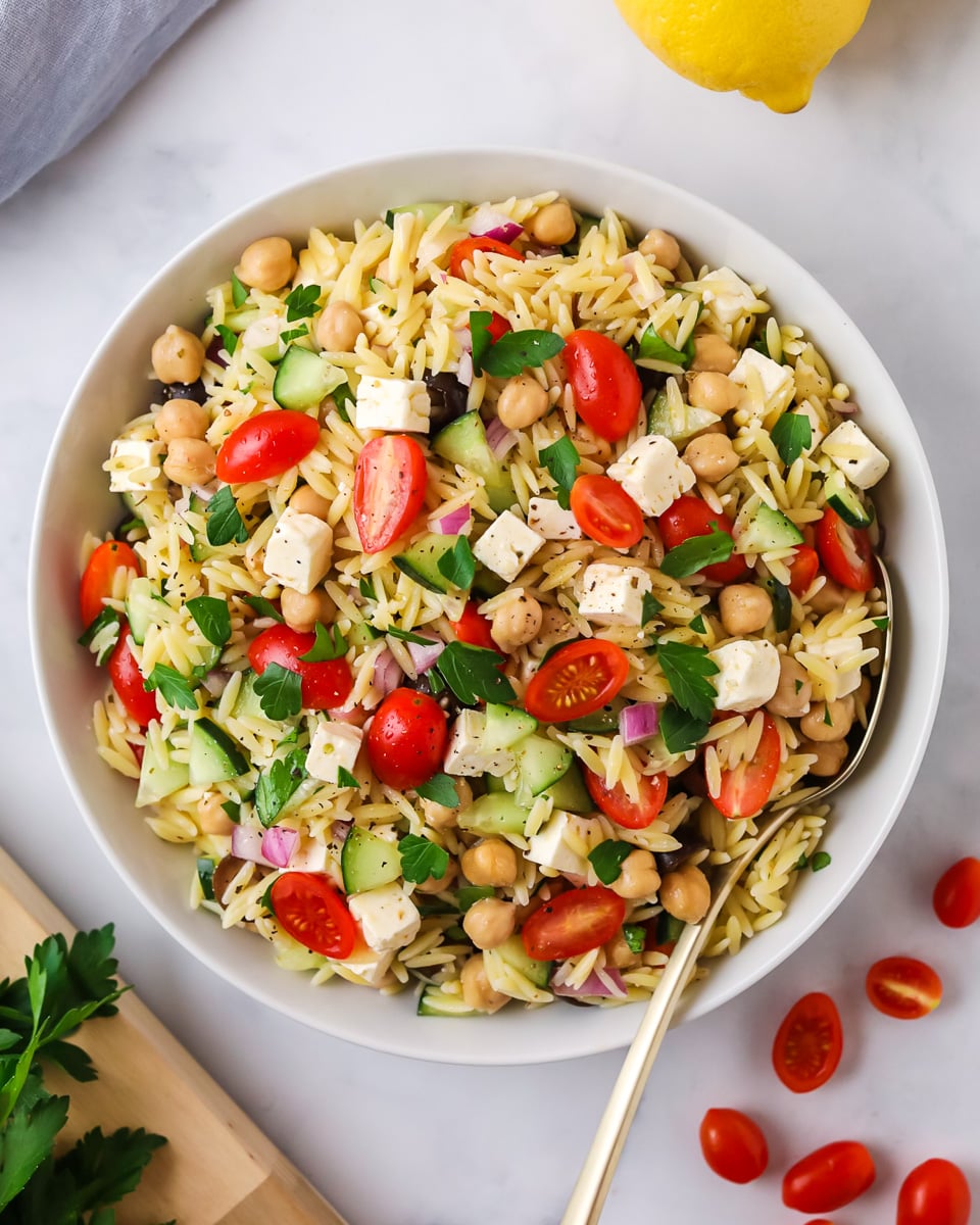 Orzo pasta salad on table.