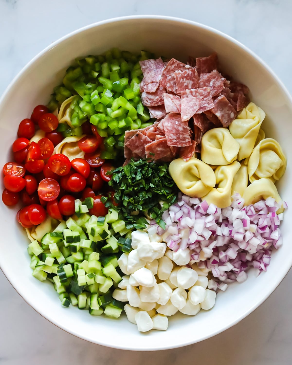 Tortellini pasta salad ingredients.