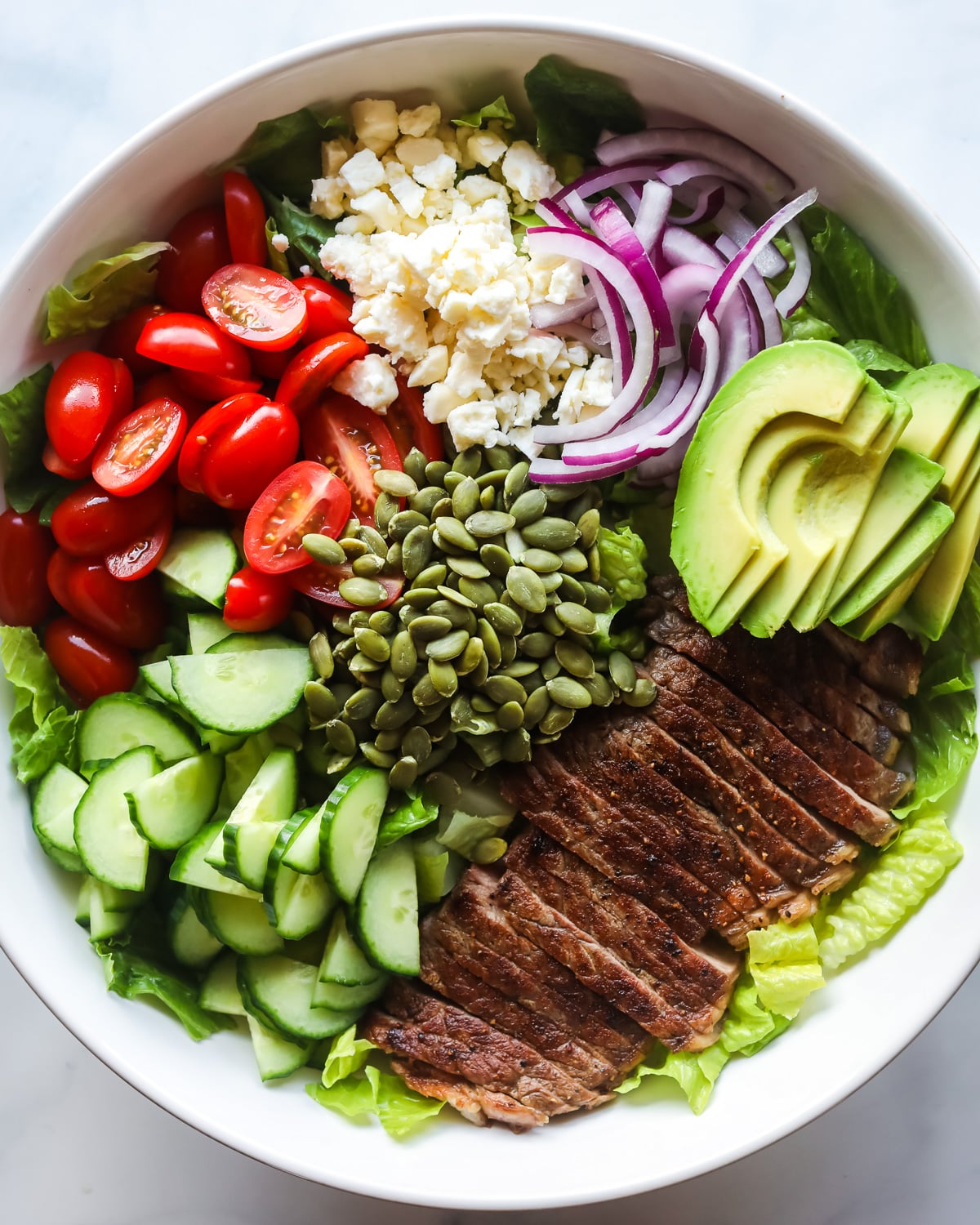 Steak salad ingredients.