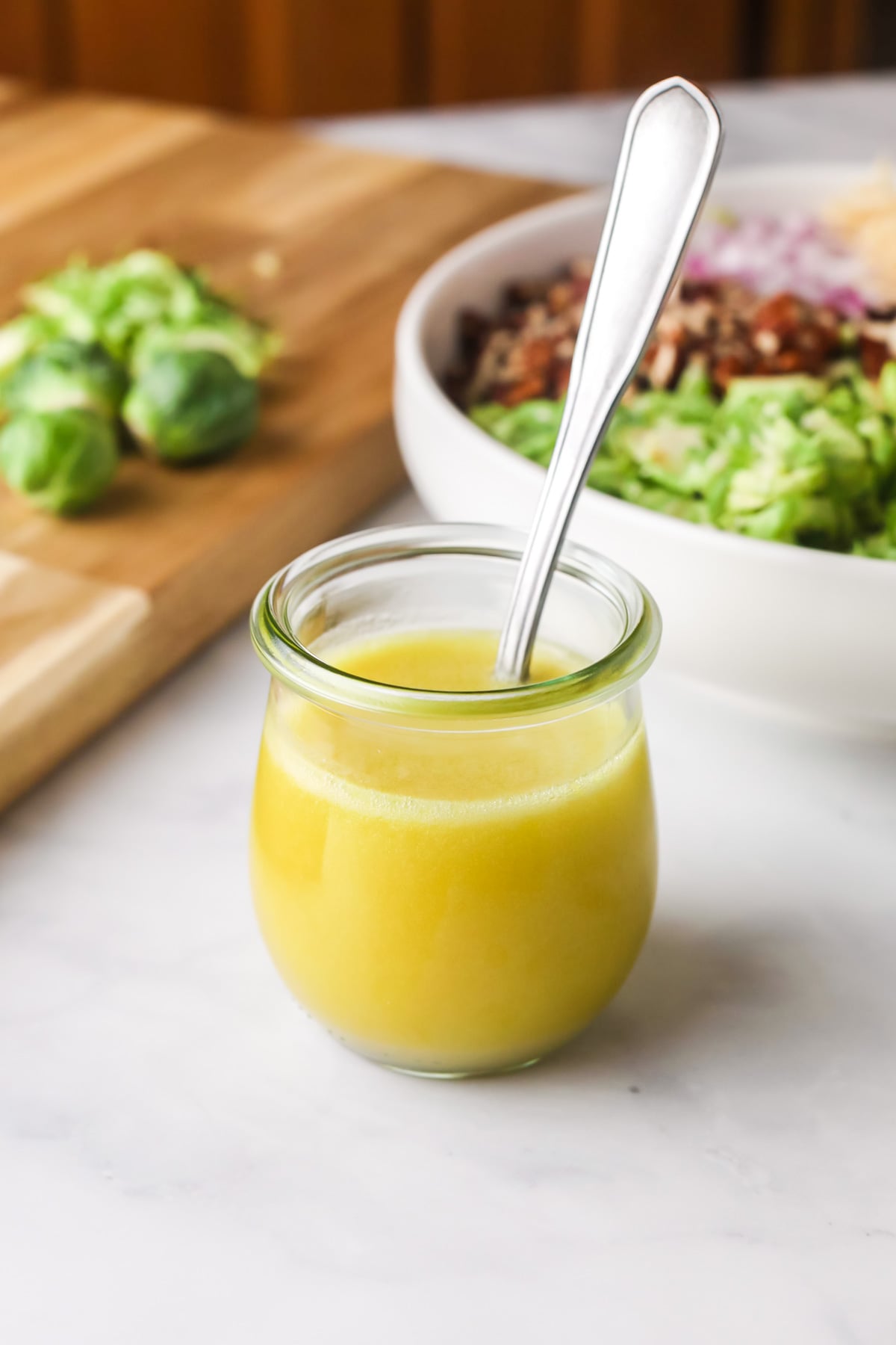 Honey mustard dressing in jar.