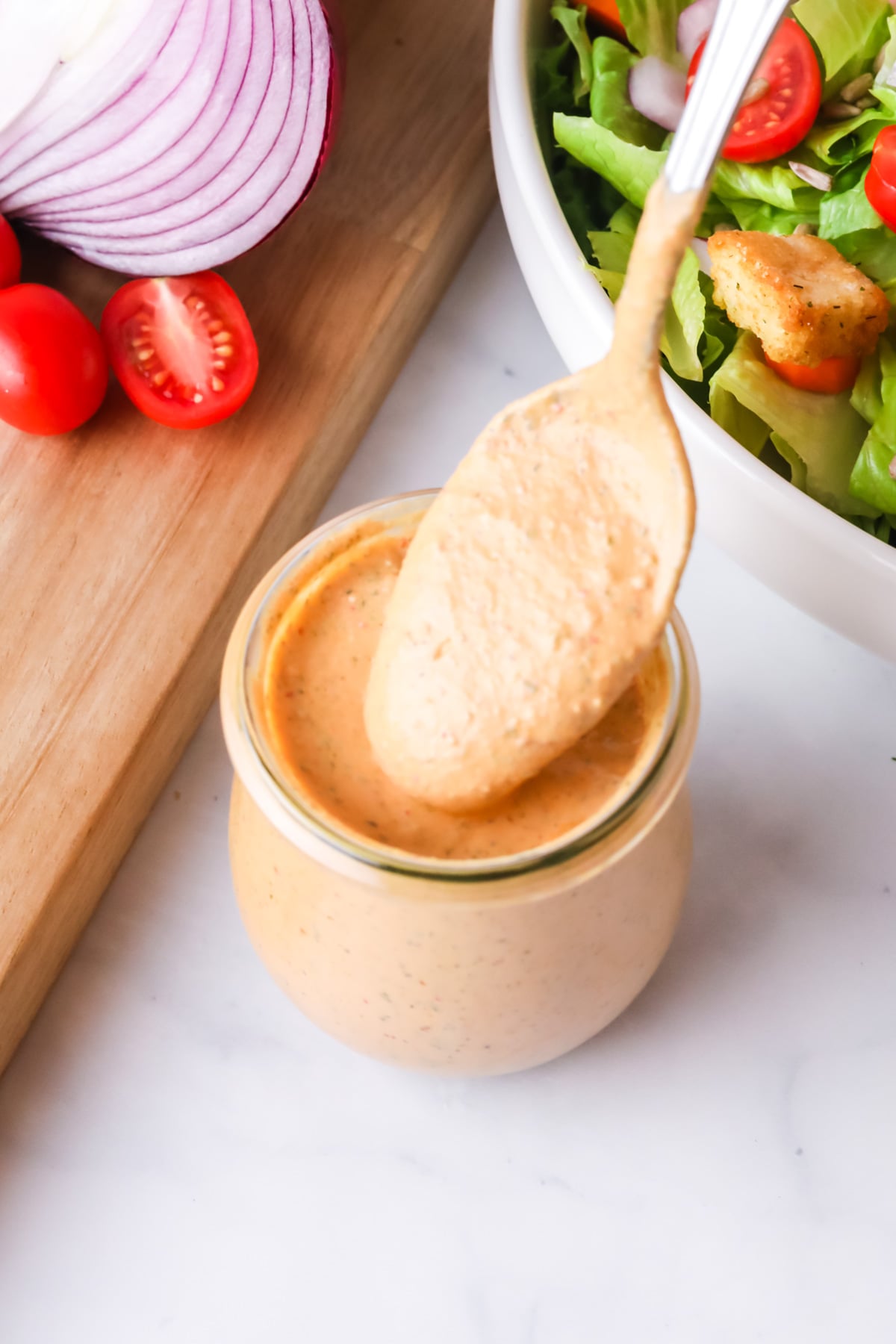 Chipotle Ranch dressing with spoon.