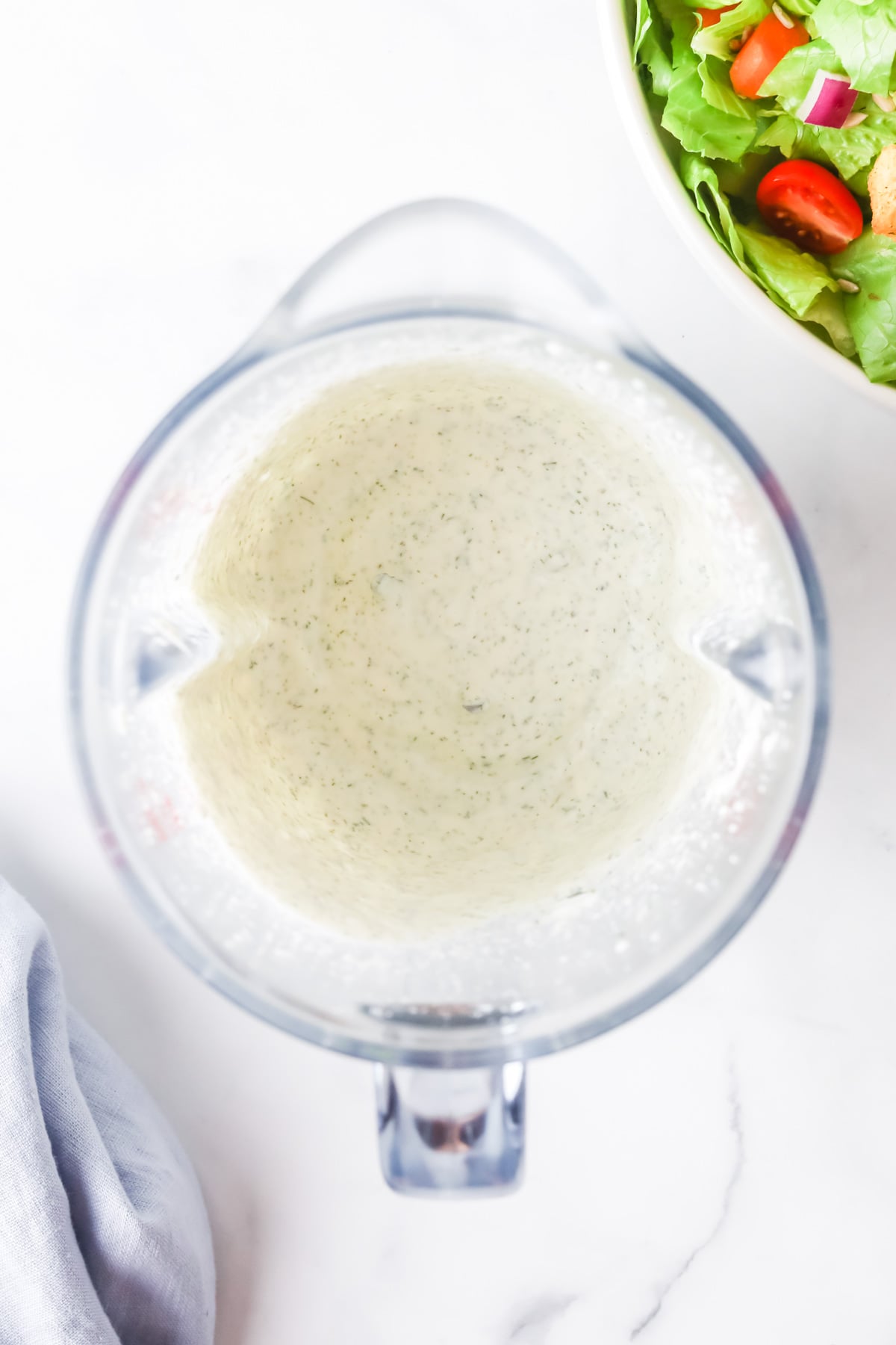 Making ranch dressing in a blender.