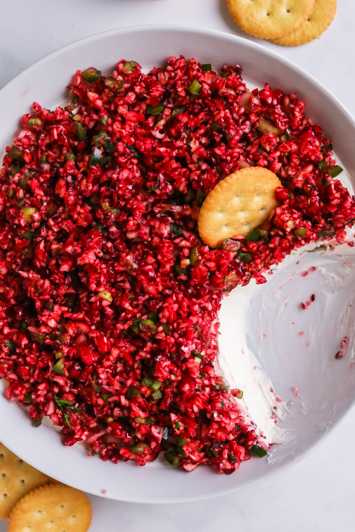 Cranberry jalapeno dip with crackers.
