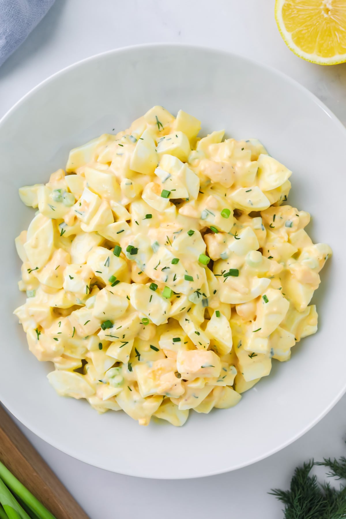 egg salad in white bowl.