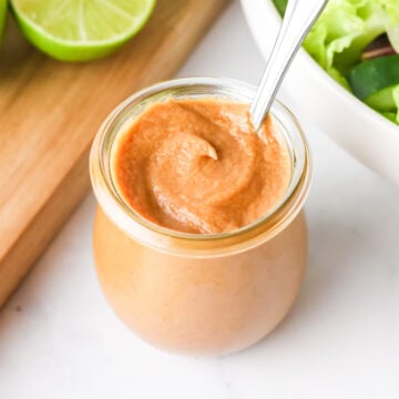 Peanut salad dressing in a jar.