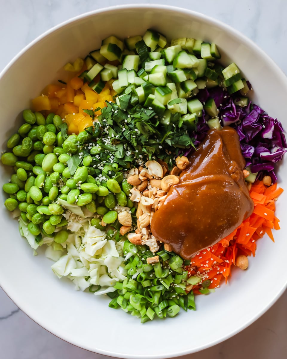Thai crunch salad with peanut salad dressing.