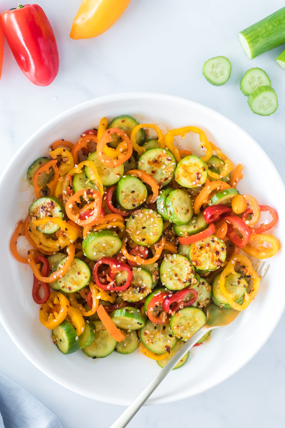 Cucumber pepper salad in bowl.