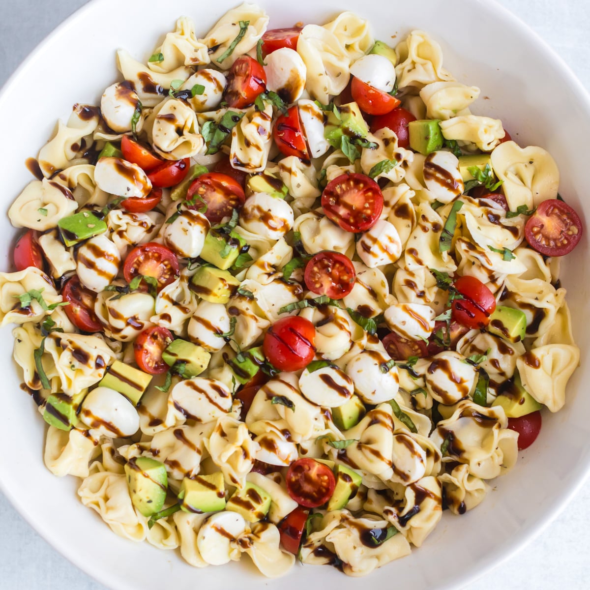 Caprese tortellini past salad with balsamic.
