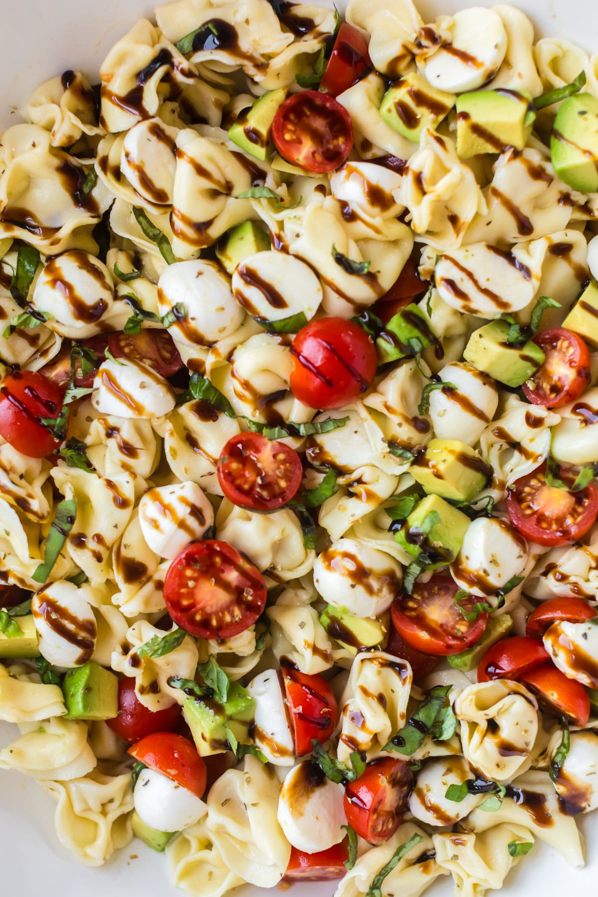 Caprese tortellini pasta salad with balsamic.