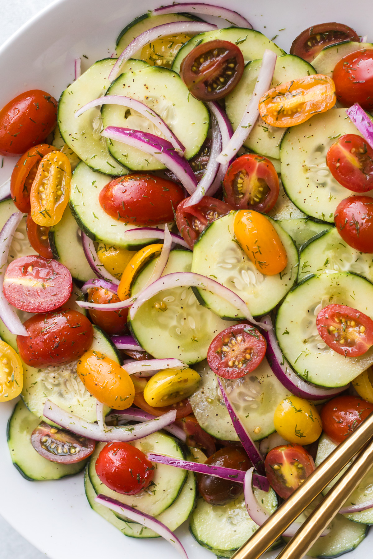 Cucumber tomato salad with dill.
