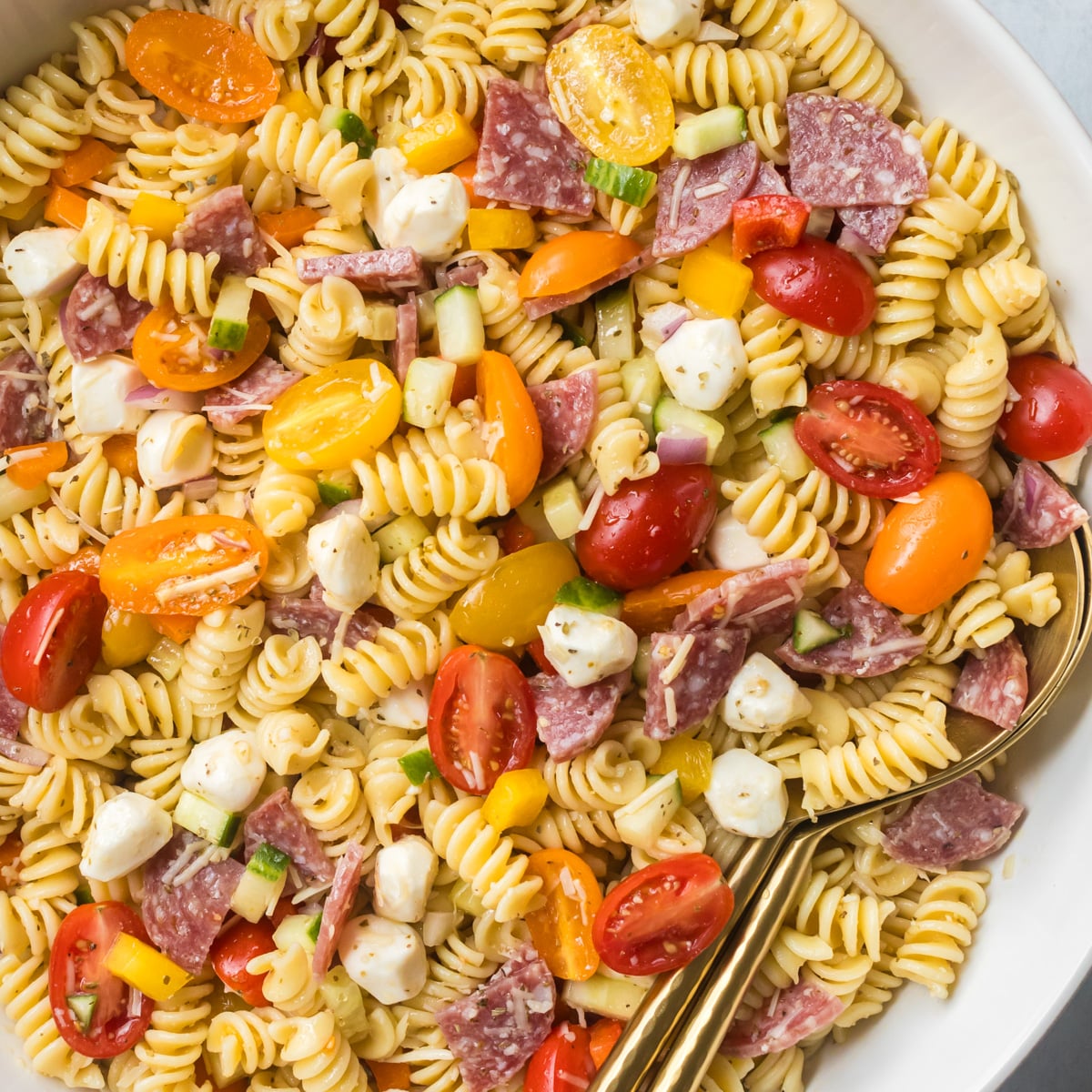 Pasta salad with salami.