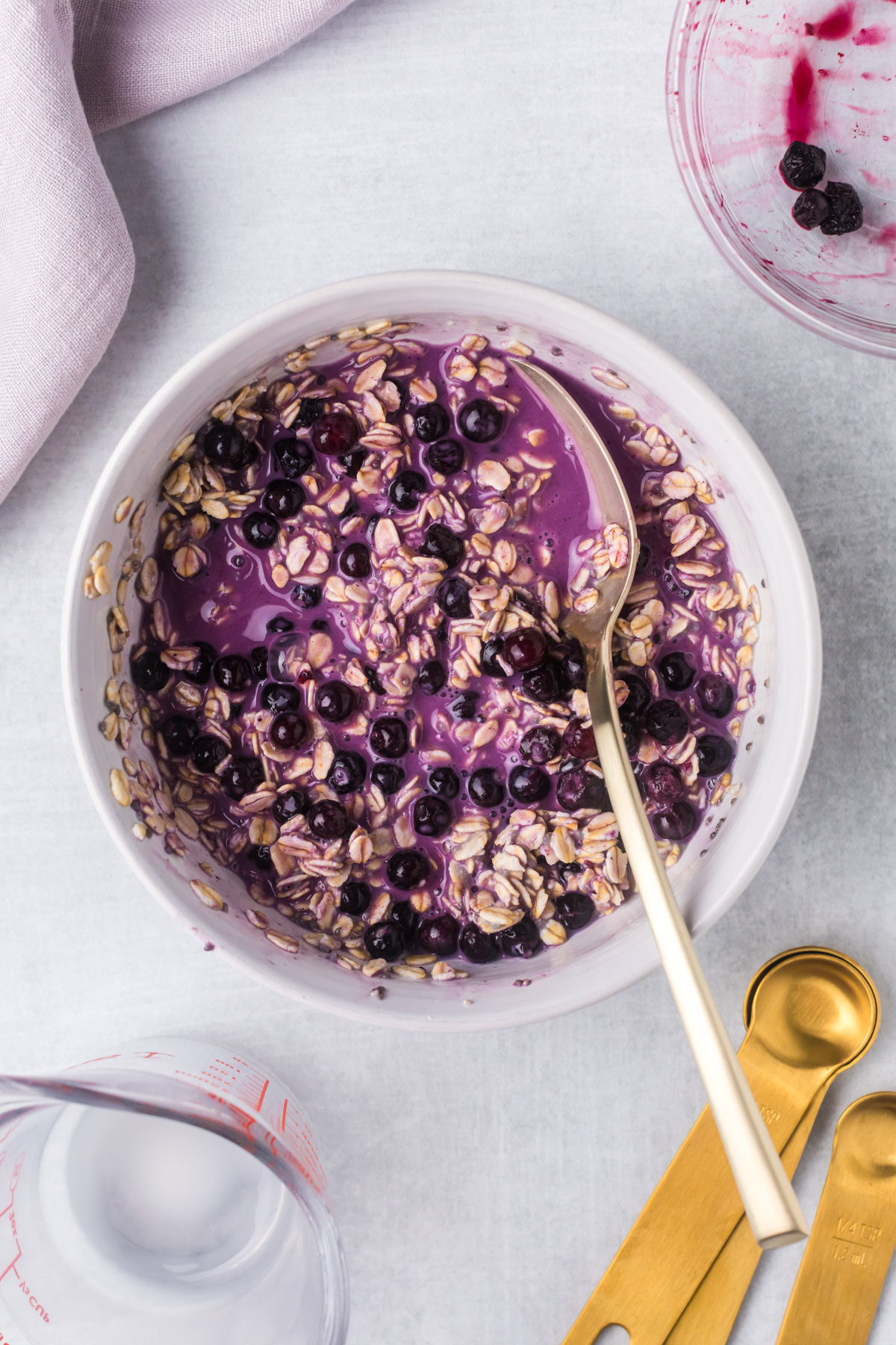 Stirring in the blueberries.