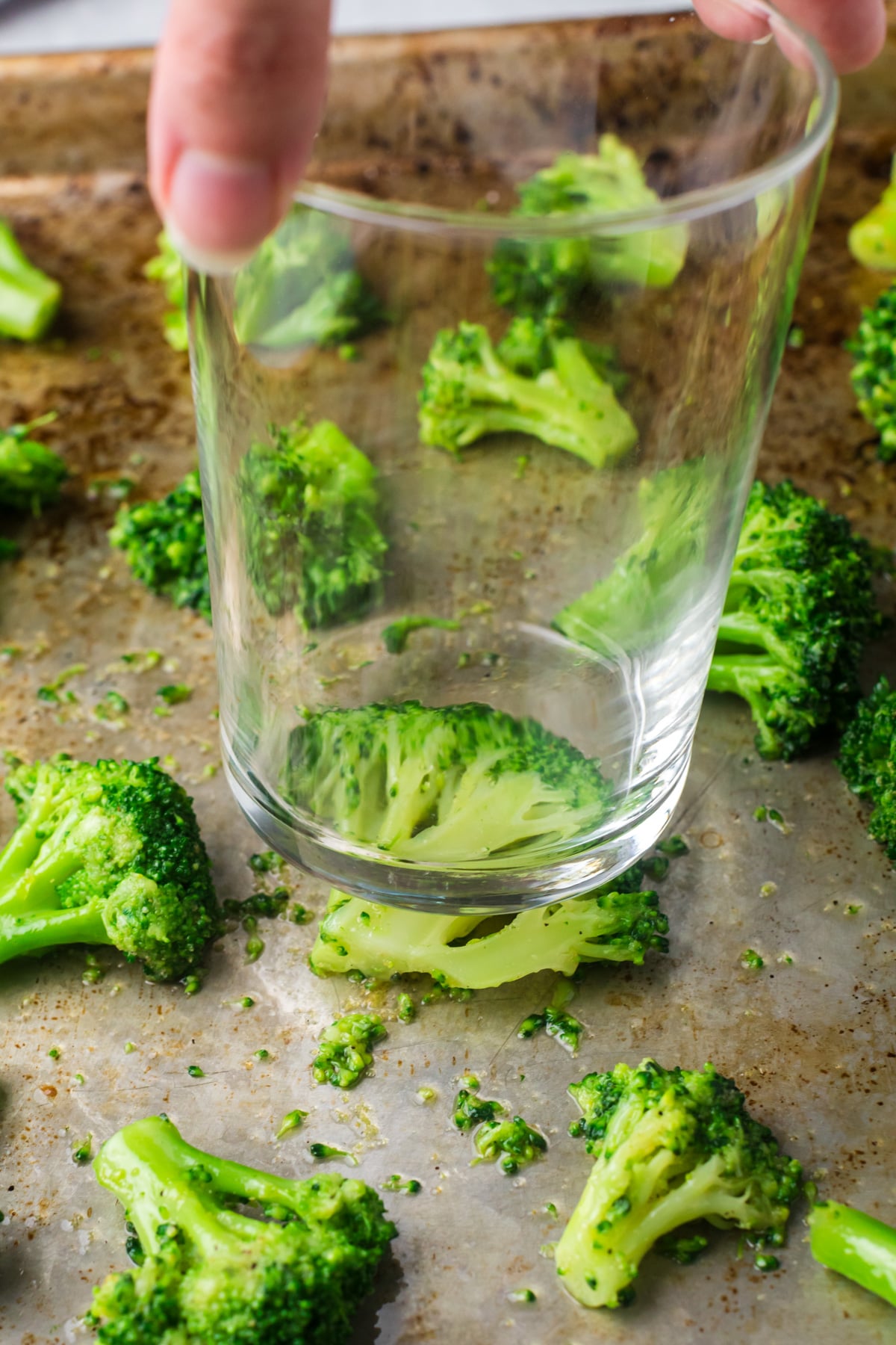 Smashing broccoli florets.