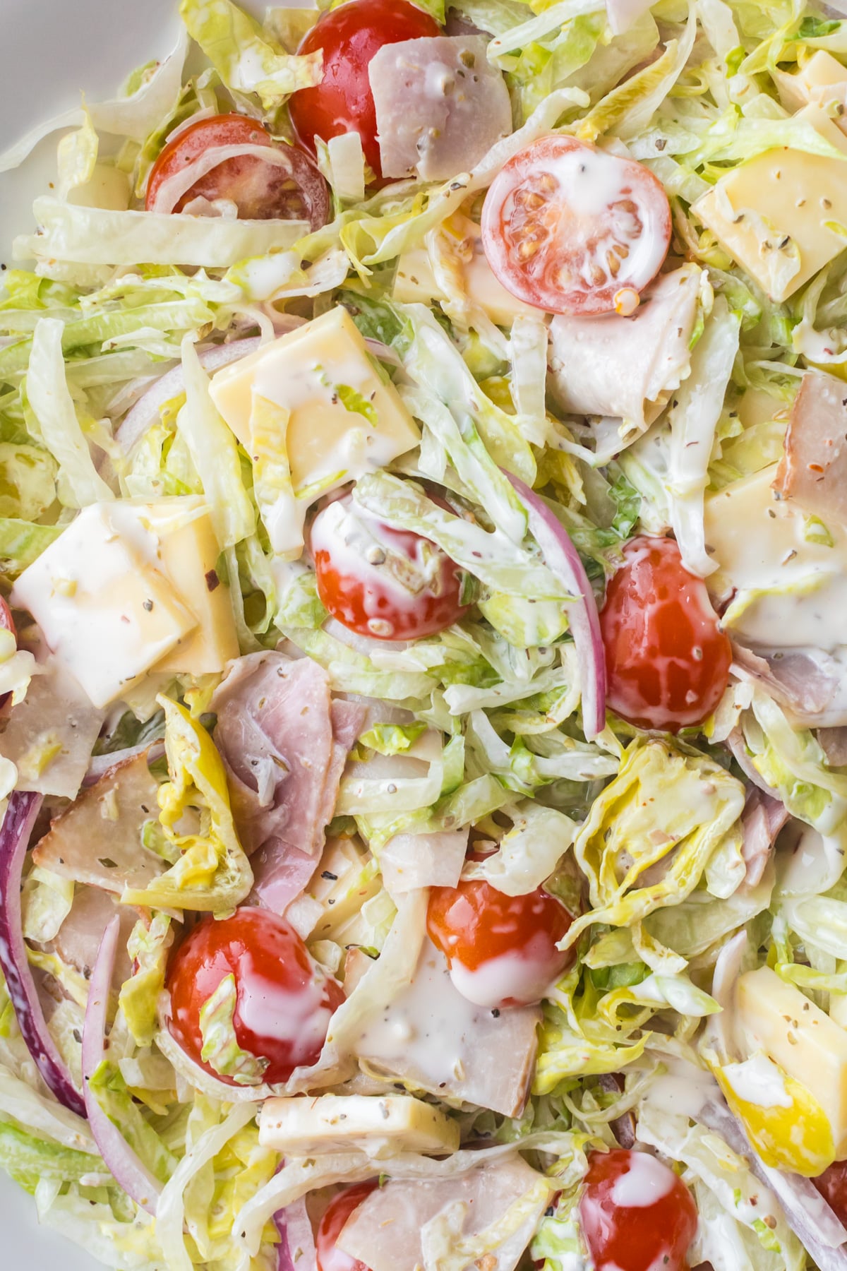 Grinder salad with cheese.