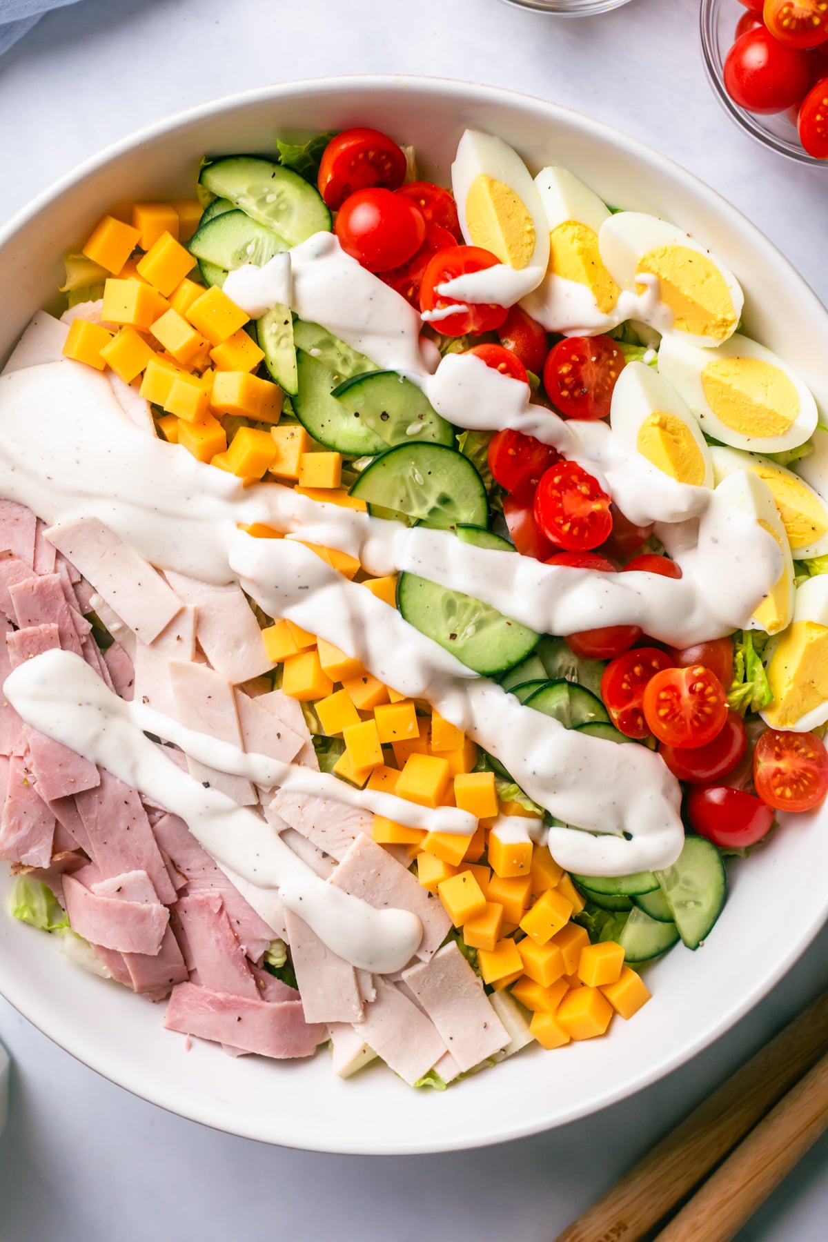 Chef salad with turkey and ham.