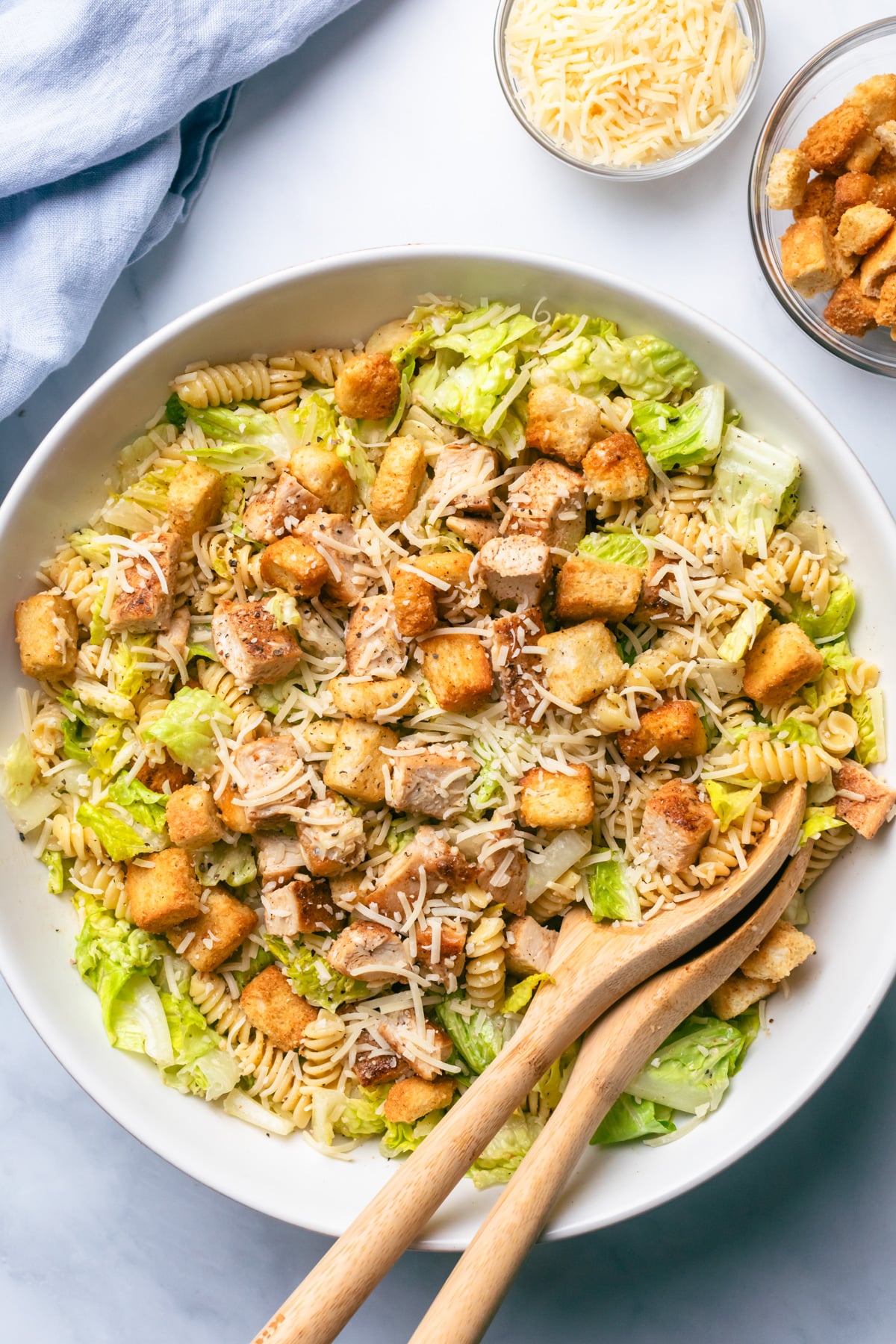 Chicken caesar pasta salad in serving bowl.